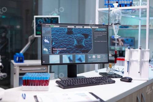 Preview: Computer with microbiology virus expertise on display standing on table