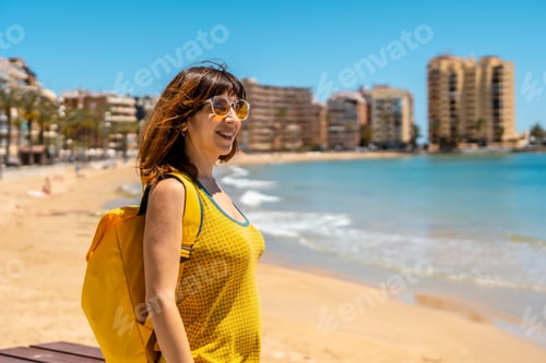 Preview: A young foreign tourist at Playa del Cura in the coastal city of Torrevieja, Alicante