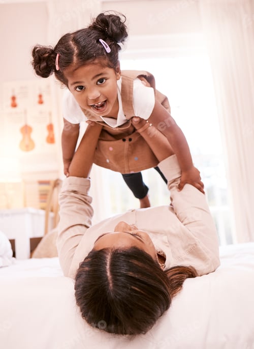 Preview: So much fun with mommy. Shot of a little girl playing with her mother at home.