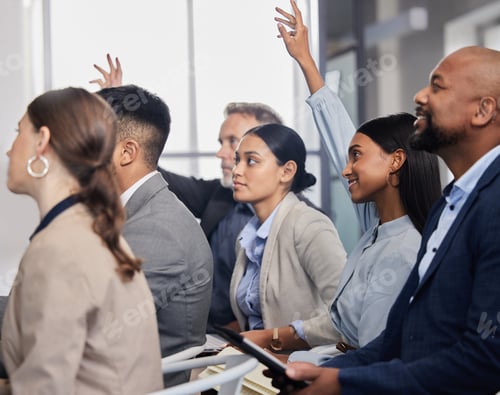 Preview: Shot of a group of business people asking questions during a conference