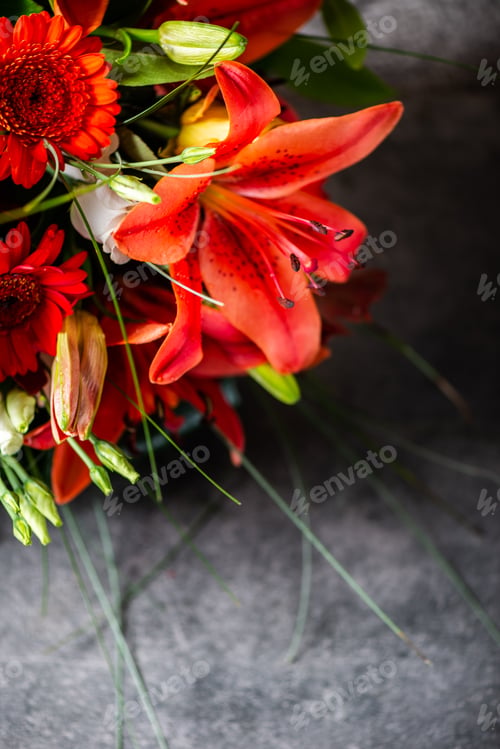 Preview: Vibrant Bouquet of orange Asiatic lilies and other flowers