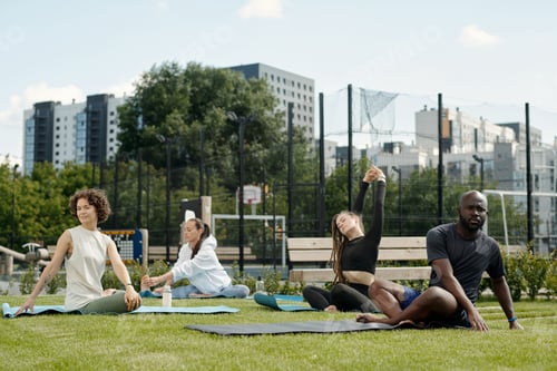 Preview: People Stretching Outdoors in an Urban Park