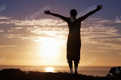 Preview: Silhouette with Arms Open to Sky at Sunrise