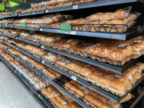 Preview: Bread for sale on supermarket shelving