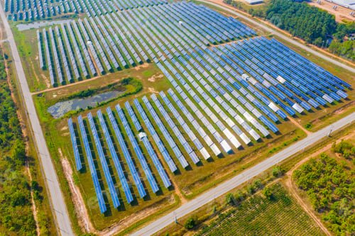 Preview: Aerial view of solar panels or solar cells on the roof in farm. Power plant for electric in industry