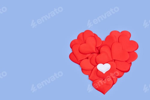 Preview: Red is a heart shape consisting of many small hearts on a blue background