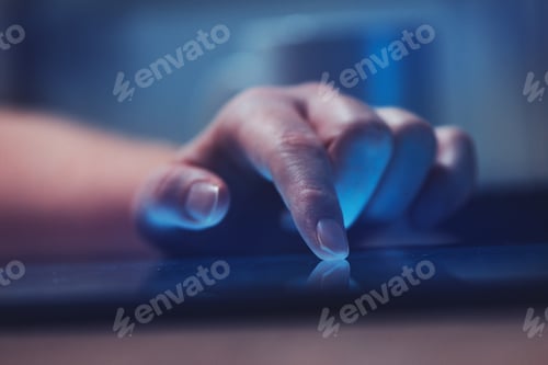 Preview: Woman reading online news on digital tablet