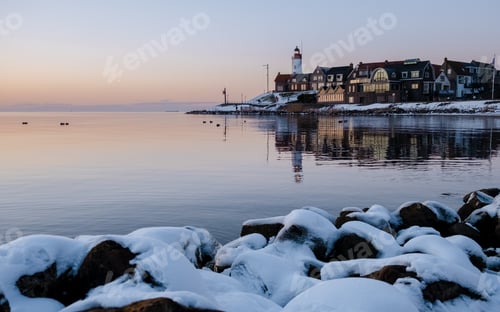 Preview: Lighthhouse of Urk Netherlands during sunset in the Netherlands