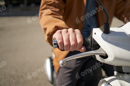 Preview: Close-up of the motorcyclist's hand. The concept of speed, movement, forward motion,