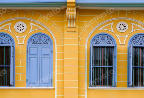 Preview: Row of blue wooden arch windows on vintage yellow building wall background