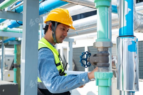 Preview: Engineer under industrial inspection Large water heaters are used in high-rise condominiums