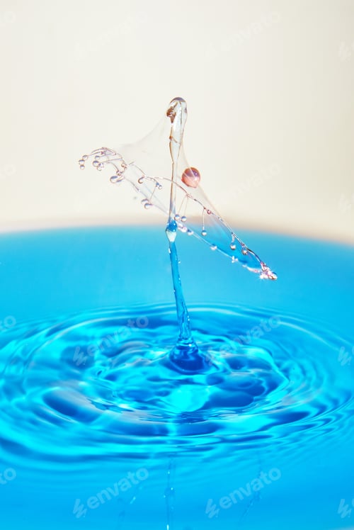 Preview: Abstract background of splash of color water, collision of colored drops, the concept