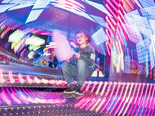 Preview: Boy with candy floss on funfair