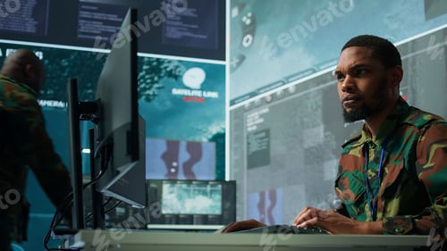 Preview: Military professionals in a mission control center employs modern technology