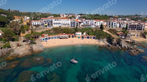 Preview: Aerial view of Costa Brava paradise beach in summer and people swimming in clear waters