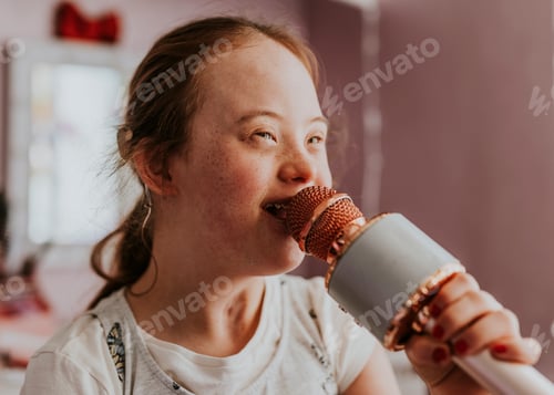 Preview: Happy girl with Down Syndrome singing