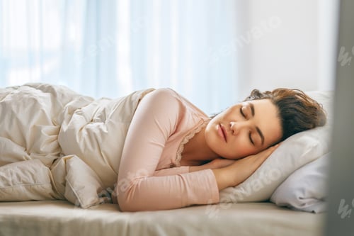 Preview: Woman is sleeping in her bedroom