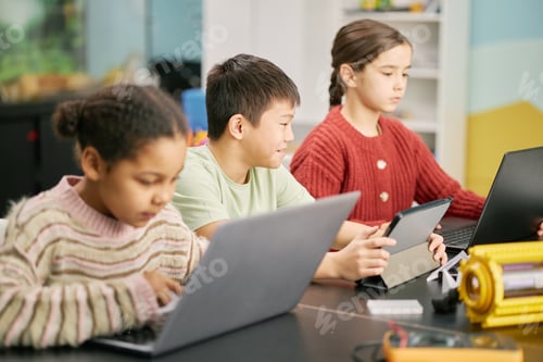 Preview: Children Engaging in Classroom with Digital Devices