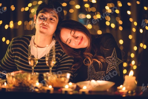 Preview: couple celebration concept, Christmas or new year party with romantic night light, home winter happy