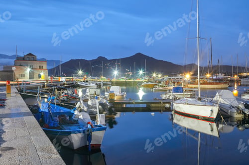 Preview: Exciting sunset view on boats in beautiful marina of Villasimius.