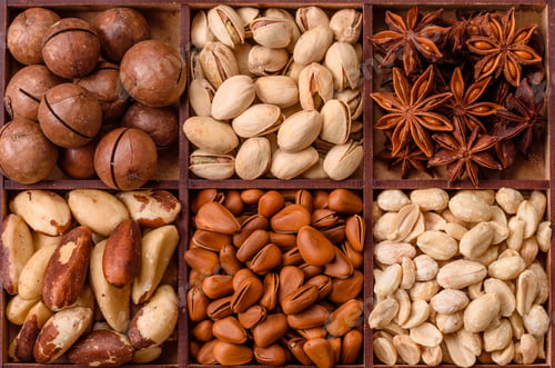 Preview: Box with various nuts cashew, macadamia, peanut, cedar, pecan, walnut, brazil, hazelnut