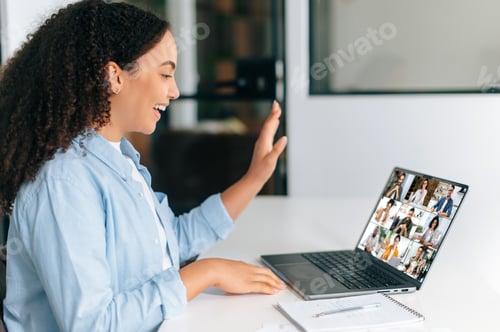 Preview: Video call, group brainstorm. Successful brazilian or hispanic businesswoman, team leader, sitting