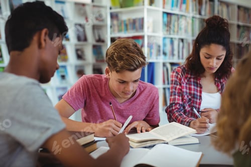 Preview: Attentive classmates studying in library