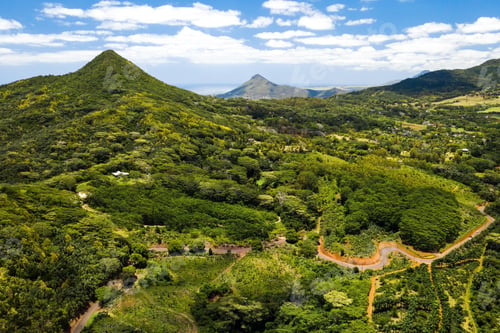 Preview: Bird's-eye view of the mountains and fields of the island of Mauritius.Landscapes Of Mauritius