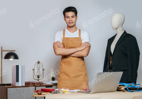 Preview: Portrait Young Fashion designer man working in studio