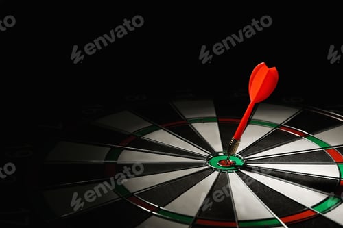 Preview: Red arrow hitting target on dart board against black background. Space for text
