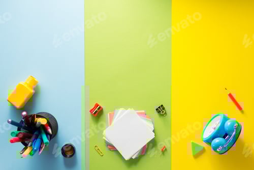 Preview: school supplies at abstract colorful background