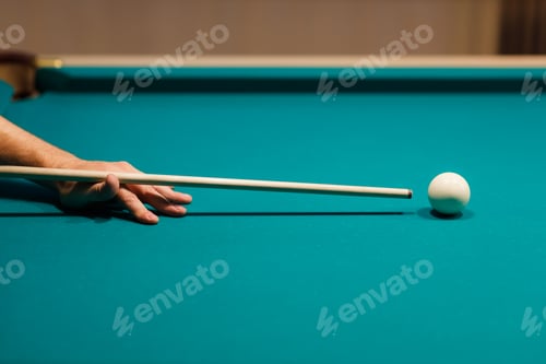 Preview: Billiard player at billard table or snooker american billiards pool sport game
