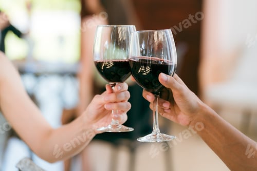 Preview: Friends raise their glasses to celebrate joyful evening filled with laughter wine delicious