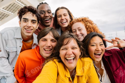 Preview: Selfie group of diverse young student friends laughing together outdoors