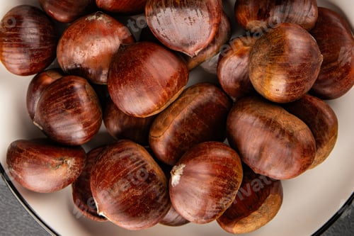 Preview: Edible chestnuts delicious treat tasty snack fresh gourmet food background on table