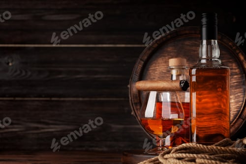 Preview: Glass and bottle with cognac