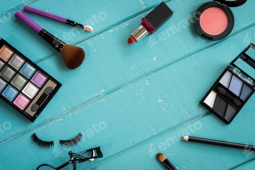 Preview: make up with cosmetics and brushes on wooden background