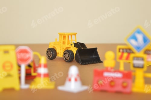 Preview: Yellow backhoe loader isolated on a blue background