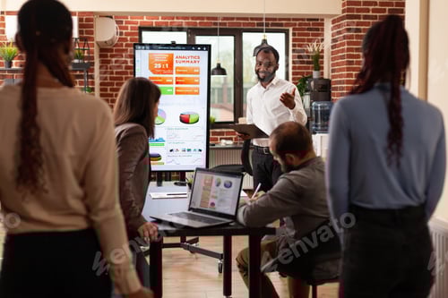 Preview: Business team working at marketing project analyzing company graph