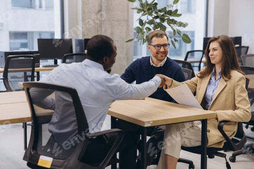 Preview: Professionals engaging in a productive meeting, showcasing teamwork and collaboration