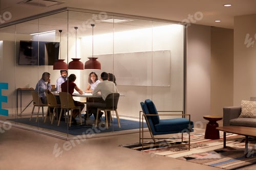 Preview: Team in a meeting cubicle at a big corporate business