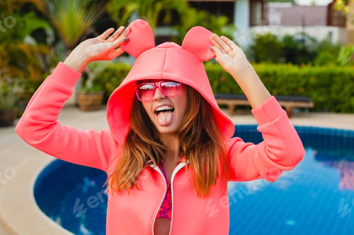 Preview: attractive woman in colorful pink hoodie