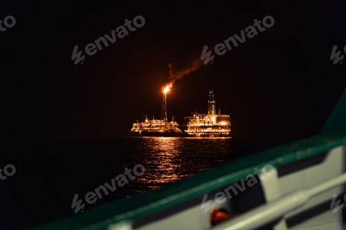 Preview: Night view of FPSO tanker vessel near Oil Rig