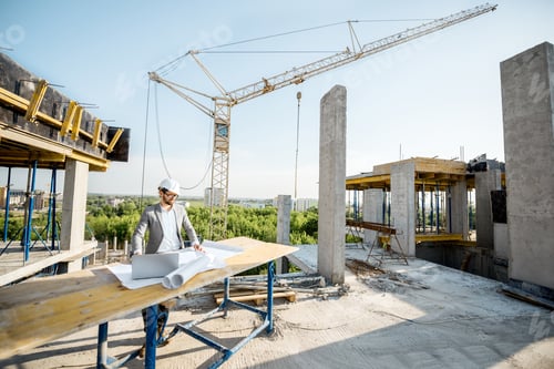 Preview: Engineer with drawings on the structure