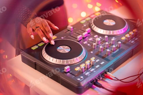 Preview: Hands of young woman of African ethnicity rotating one of turntables