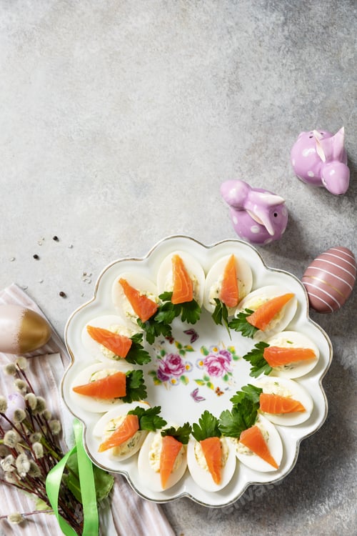 Preview: Stuffed eggs with cheese and salted salmon in the form of a carrot.