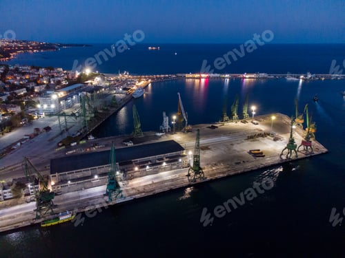 Preview: Aerial view of cargo port with Cranes in Varna Bulgaria at night