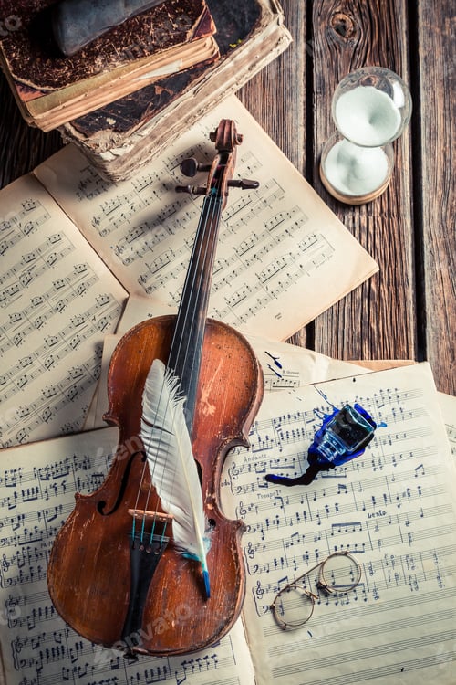 Preview: Vintage sheets and violin on old wooden table