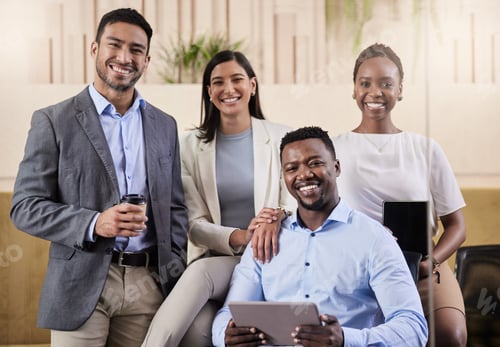 Preview: Shot of a group of coworkers using a digital tablet during a business meeting