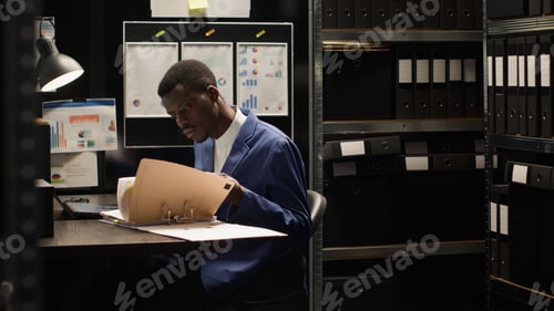 Preview: Detective inspector examining evidence